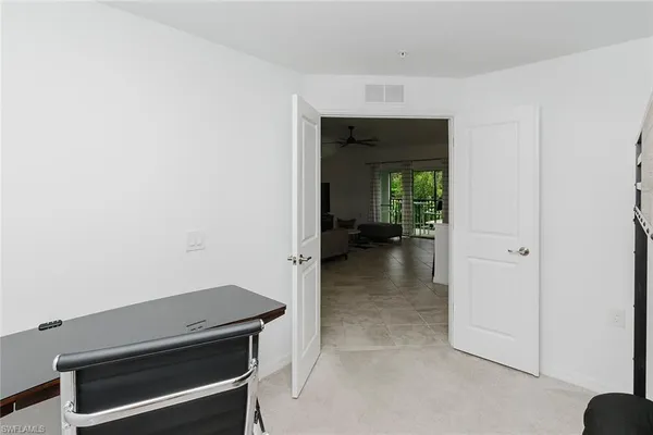 a view of a hallway with entryway