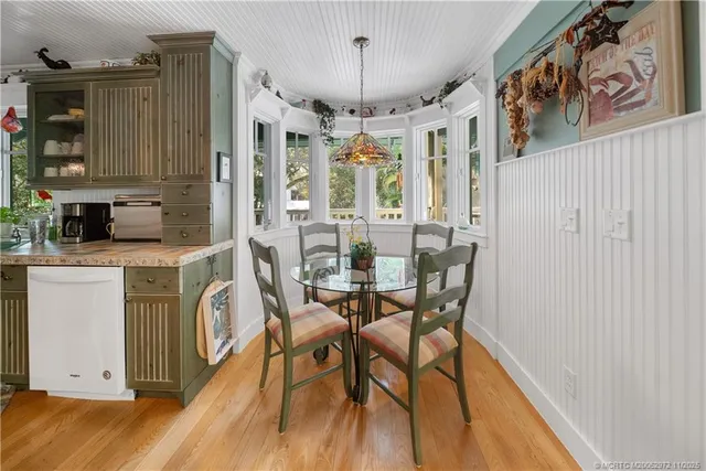 a kitchen with stainless steel appliances granite countertop a stove and cabinets