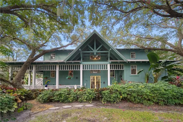 front view of a house with a garden