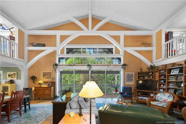 a bathroom with a tub a sink and a shower
