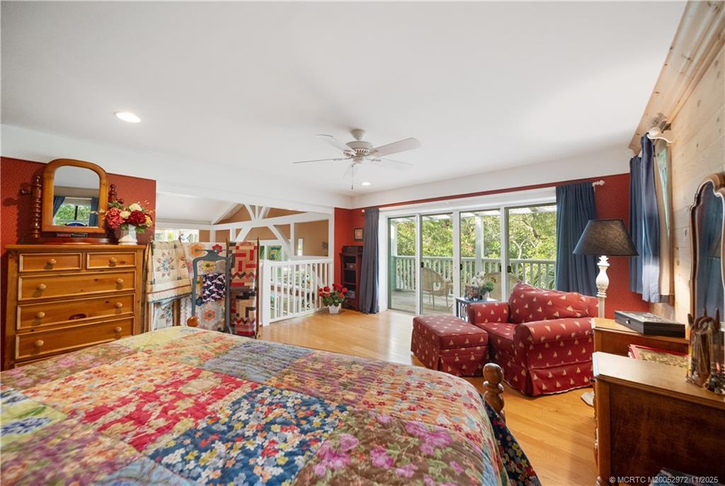 12 Oak Hill Way Stuart, FL 34996 - Photo 27 of 63 a bed room with a bed and a large window