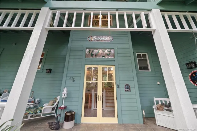 a view of front door of house and window