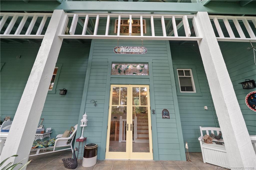 12 Oak Hill Way Stuart, FL 34996 - Photo 3 of 63 a view of front door of house and window