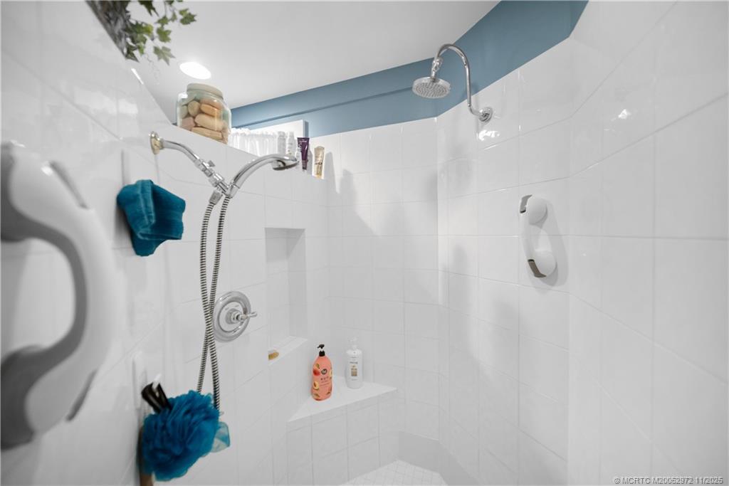 12 Oak Hill Way Stuart, FL 34996 - Photo 34 of 63 a bathroom with a shower