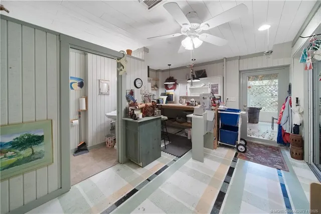 a view of a chair and table in the balcony