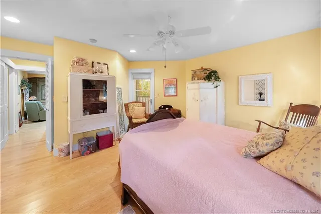 an aerial view of a house with a yard and garden