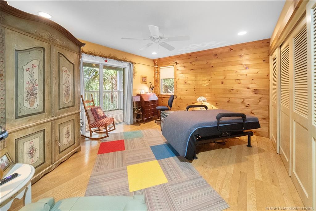 12 Oak Hill Way Stuart, FL 34996 - Photo 50 of 63 a living room with furniture and a large window