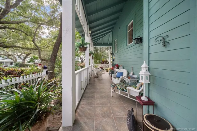 a view of balcony with wooden floor