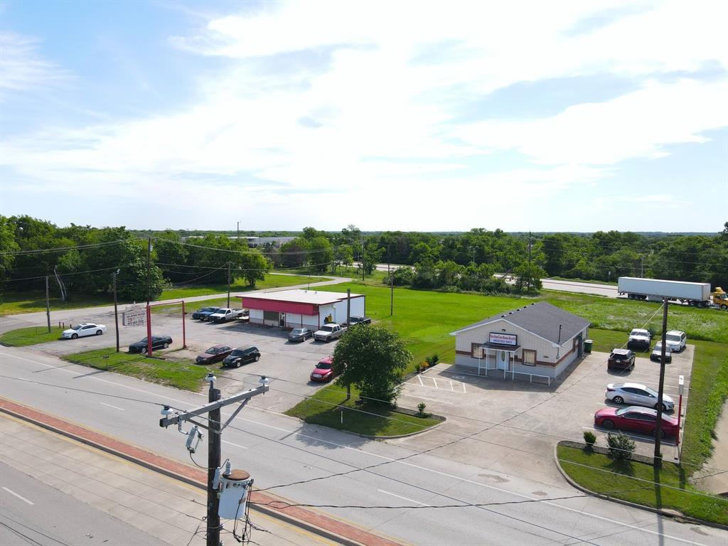 1008 South Virginia Street Terrell, TX 75160 - Photo 12 of 15 a view of a patio with chairs and a table