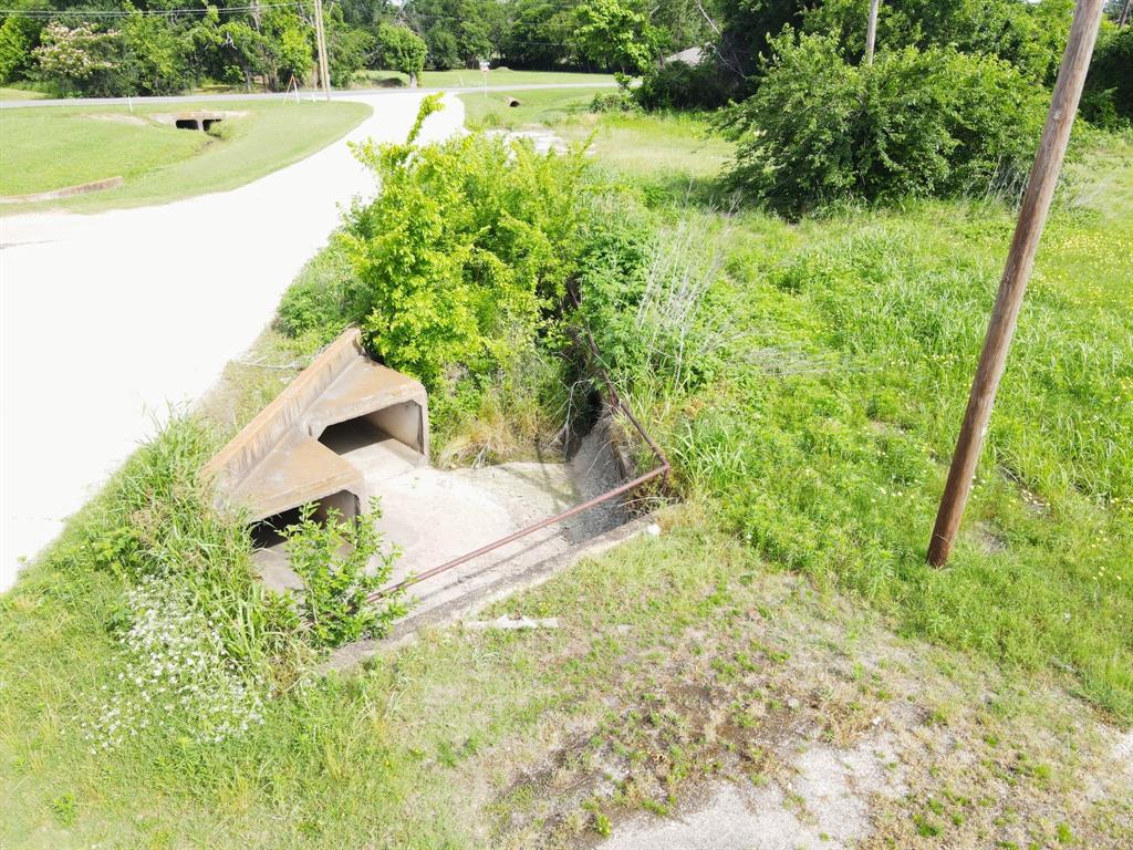 1008 South Virginia Street Terrell, TX 75160 - Photo 4 of 15 a view of a yard with an outdoor space