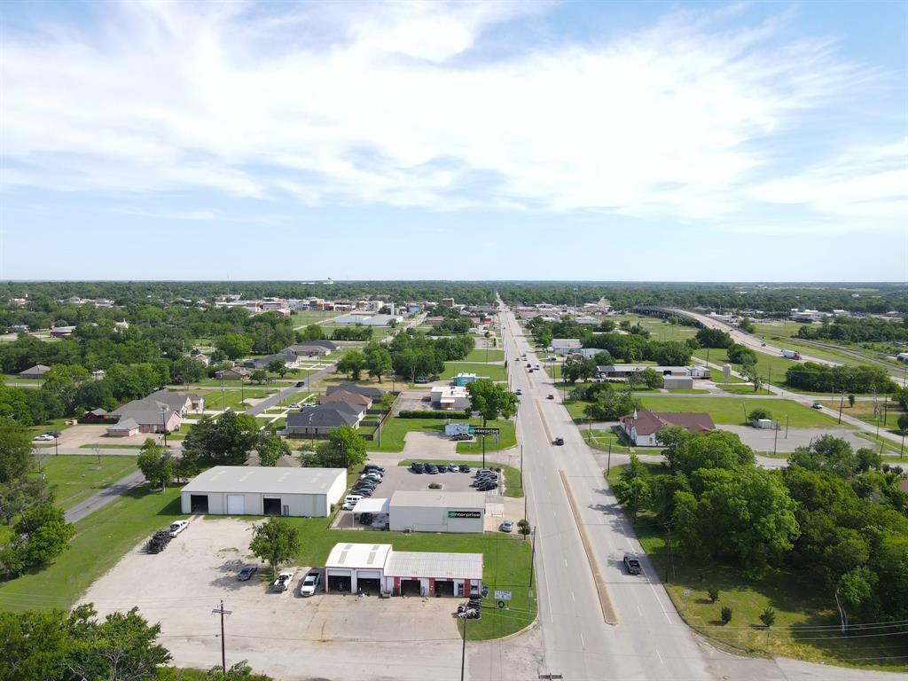 1008 South Virginia Street Terrell, TX 75160 - Photo 10 of 15 an aerial view of a city with lots of residential buildings ocean and mountain view in back