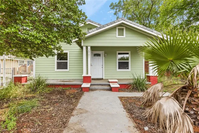 a front view of a house with porch