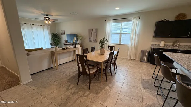 a bedroom with a bed and a mirror