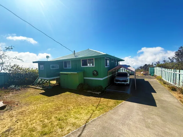 a view of a lounge chairs in patio