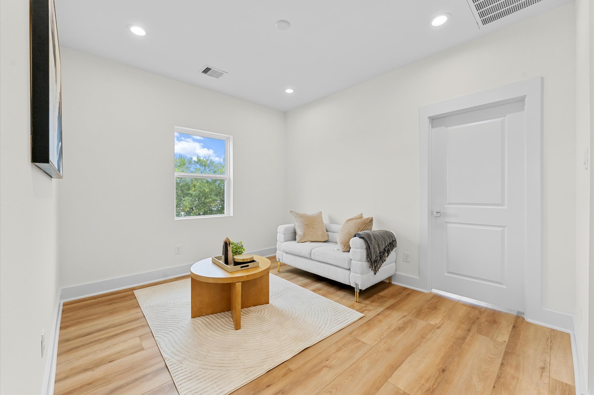 4129 De George Street Houston, TX 77009 - Photo 25 of 46 a living room with furniture and a window