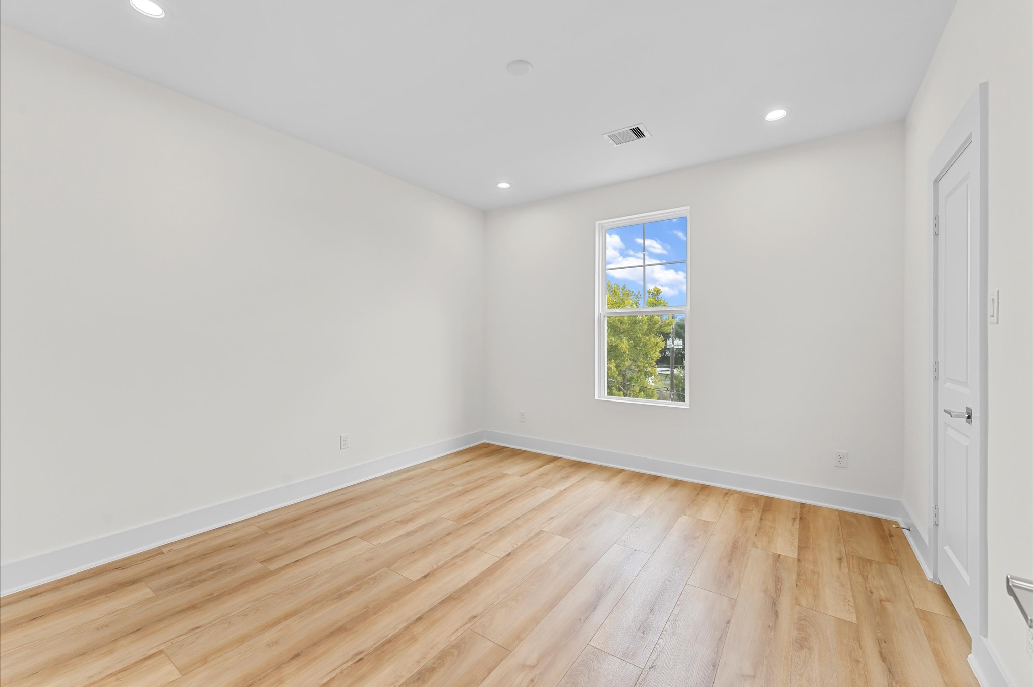 4129 De George Street Houston, TX 77009 - Photo 28 of 46 a view of room with window and hardwood floor