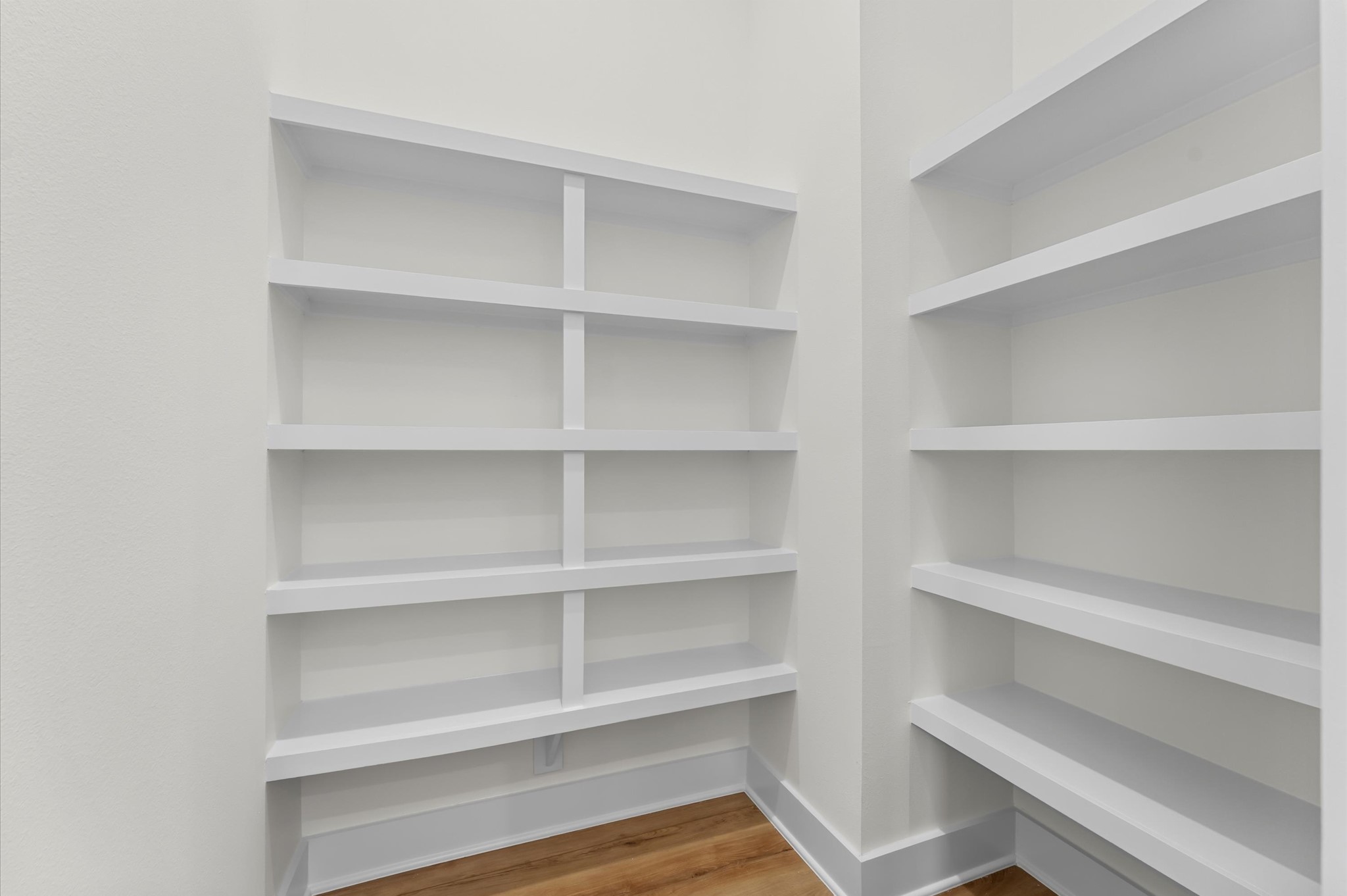 4129 De George Street Houston, TX 77009 - Photo 30 of 46 a view of walk in closet with empty racks