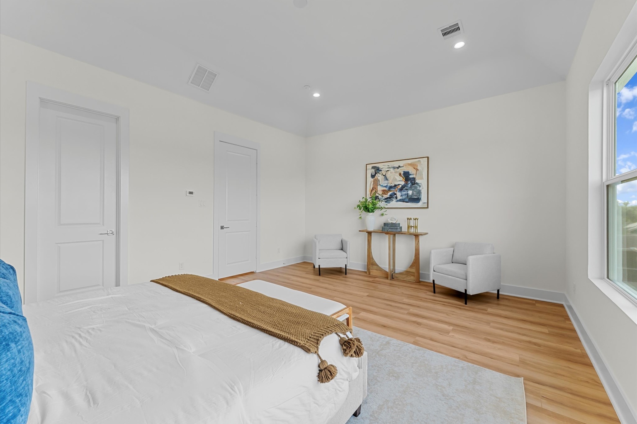 4129 De George Street Houston, TX 77009 - Photo 32 of 46 a bedroom with a bed and wooden floor