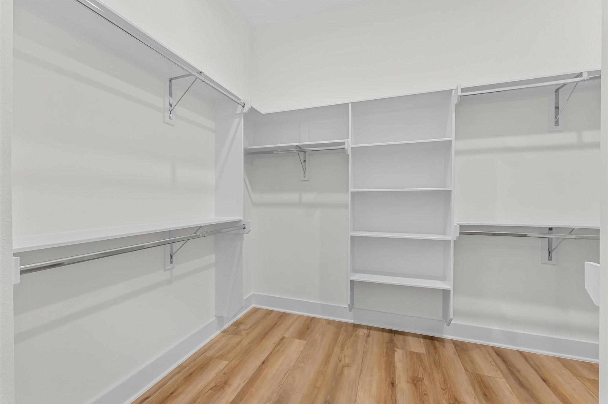 4129 De George Street Houston, TX 77009 - Photo 33 of 46 a view of walk in closet with empty racks
