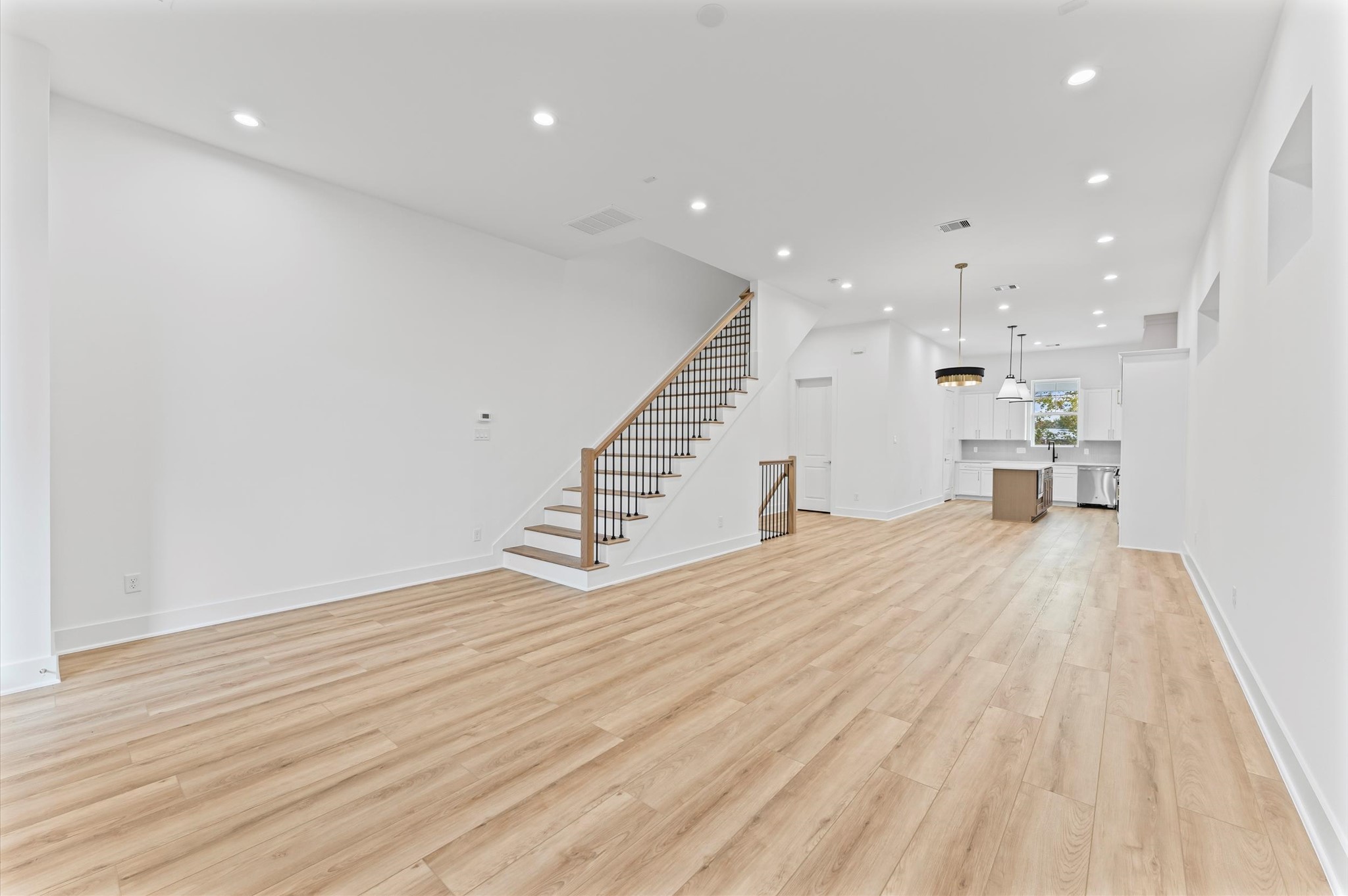 4129 De George Street Houston, TX 77009 - Photo 34 of 46 a view of an empty room with wooden floor