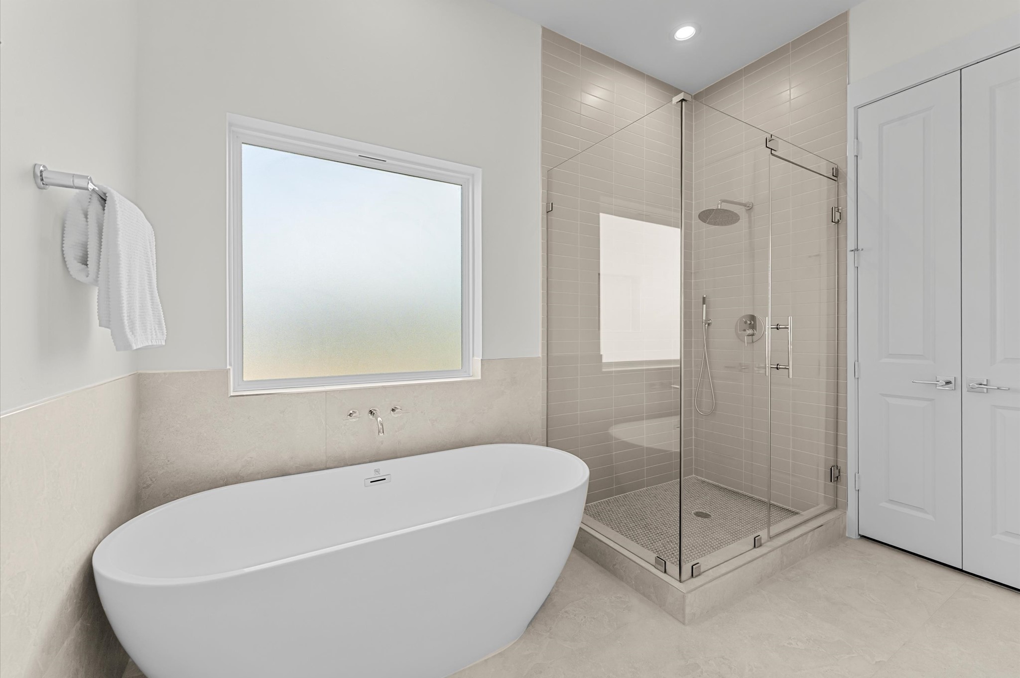 4129 De George Street Houston, TX 77009 - Photo 10 of 46 a white bath tub sitting next to a shower