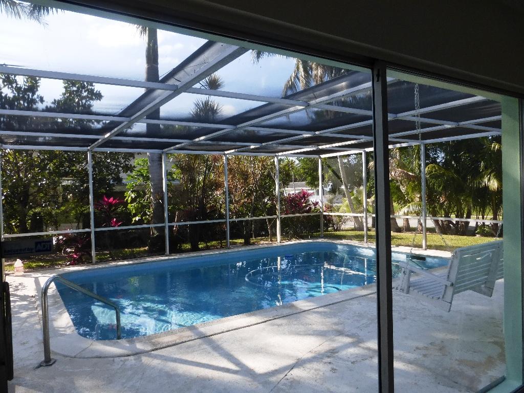 1607 High Ridge Road Lake Worth, FL 33461 - Photo 36 of 45 Sliders to Pool