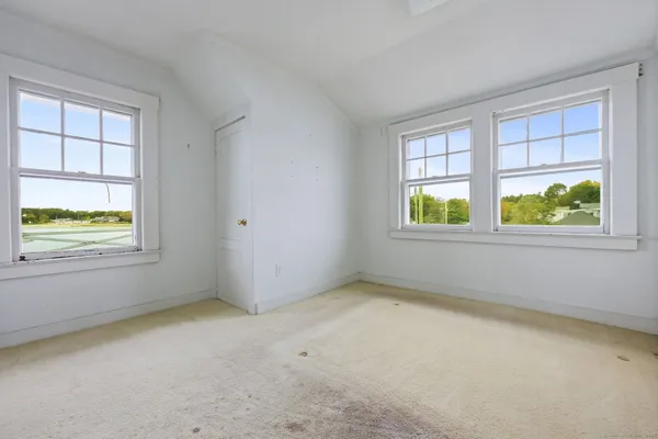 an empty room with windows