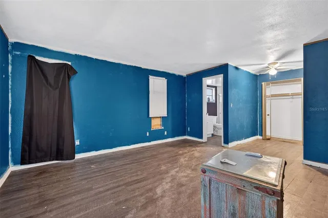 a view of a livingroom with a staircase