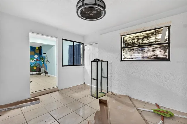 a view of livingroom with furniture and natural light