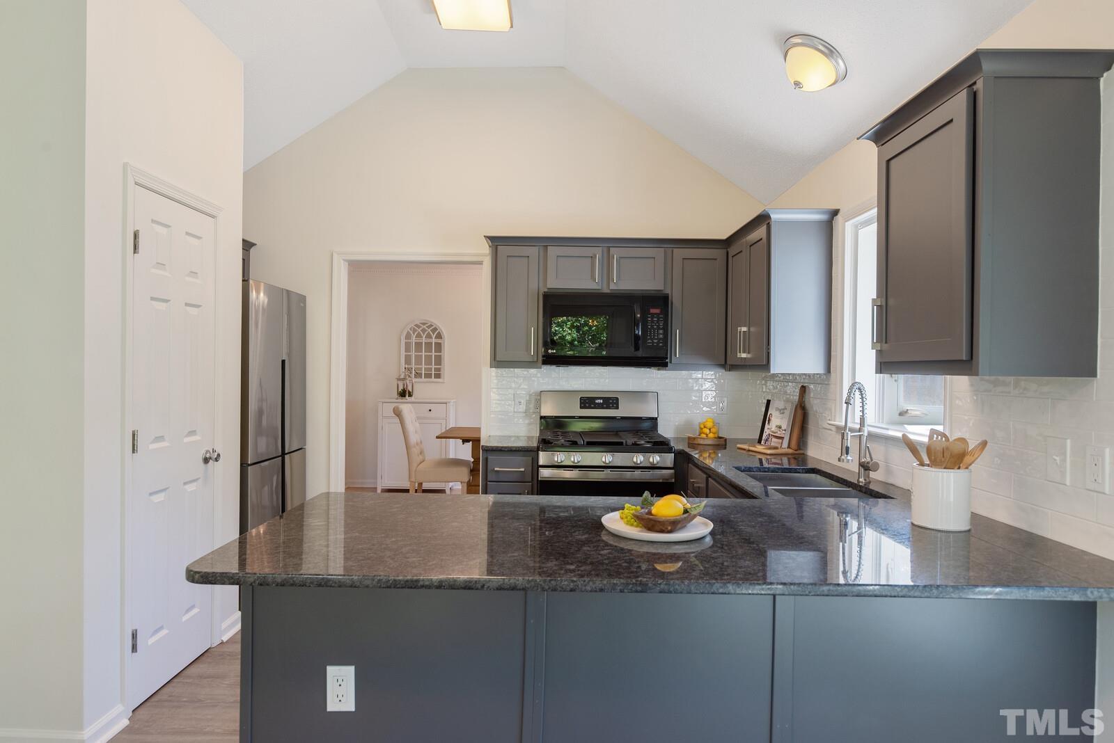 8613 Vanburgh Court Raleigh, NC 27615 - Photo 8 of 23 Gallery Image 8