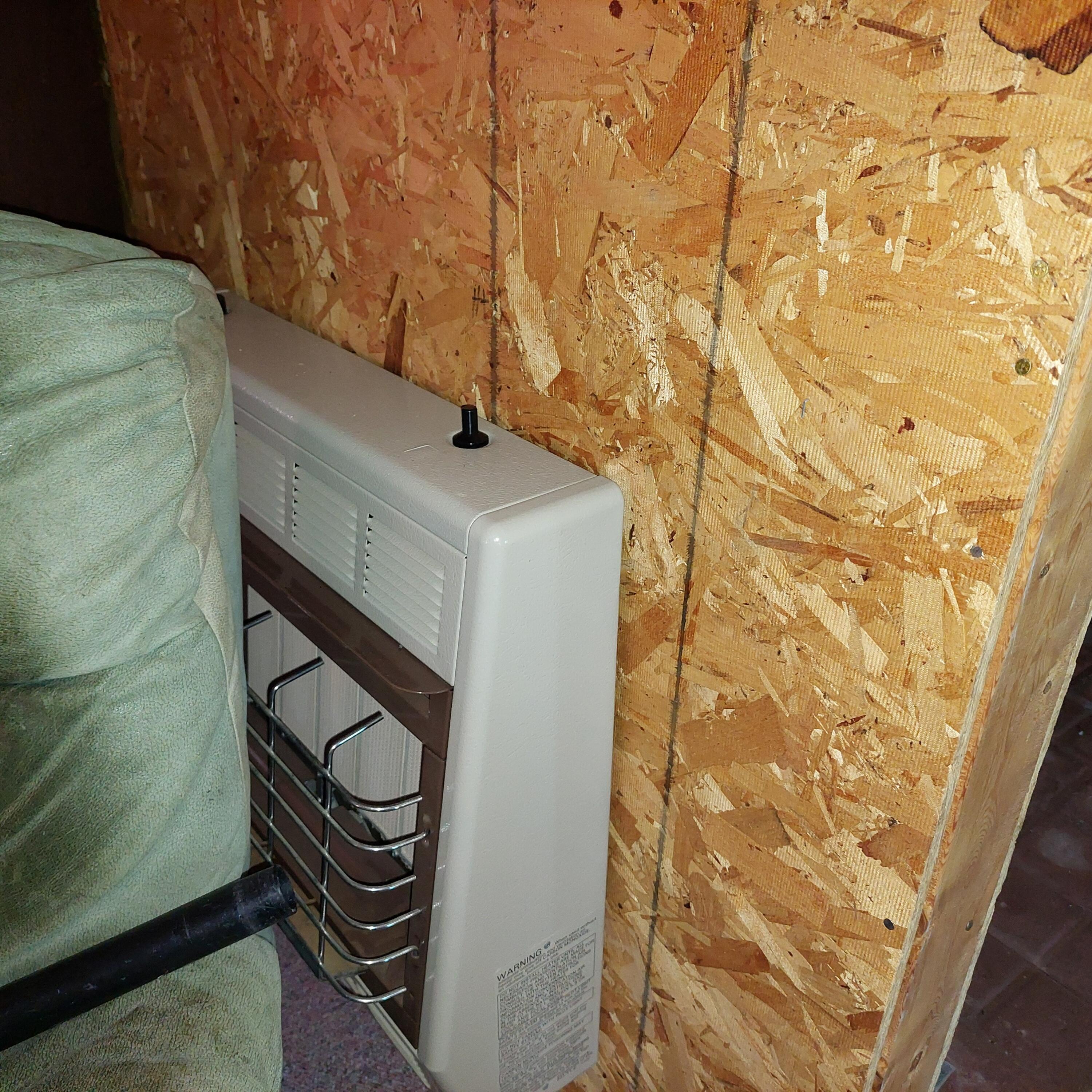 731 Kennebago Road Rangeley, ME 04970 - Photo 22 of 30 Second heat unit in living room