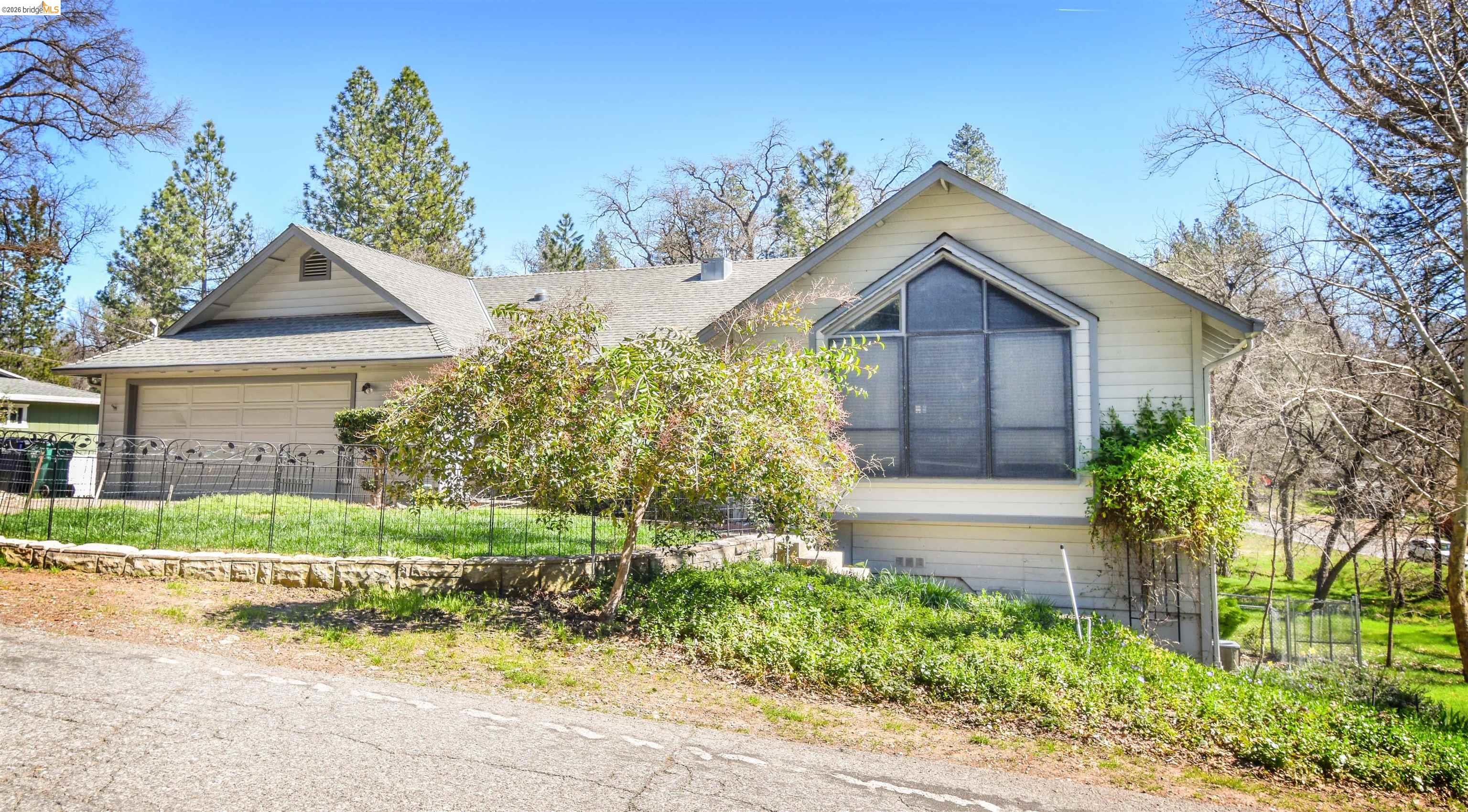 21515 Bellview Creek Road Sonora, CA 95370 - Photo 2 of 31 View of front of property with a garage and roof with shingles