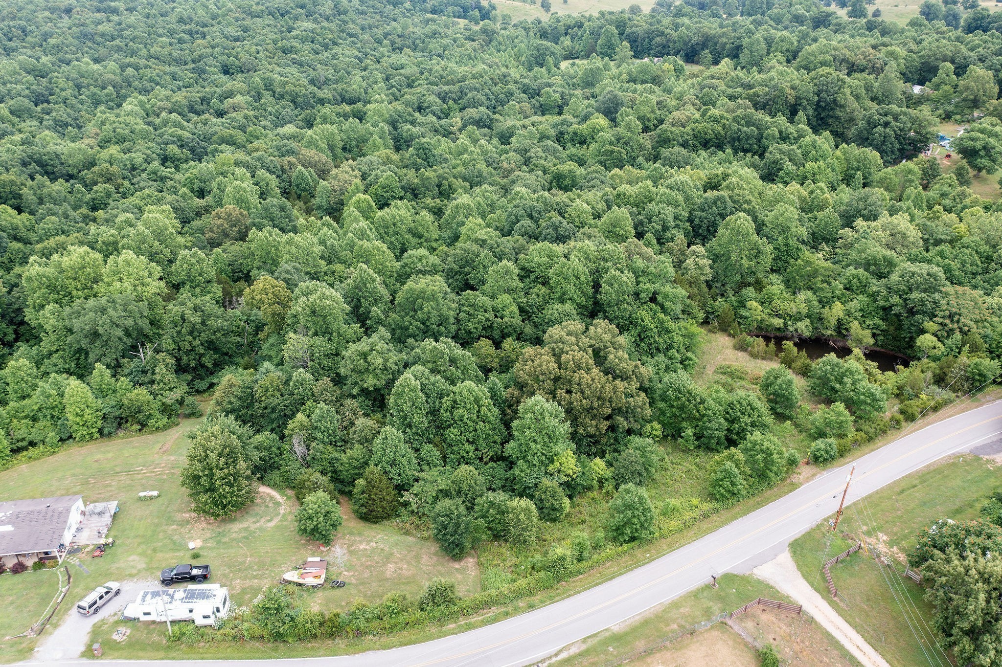 0 Jim Kim Road Palmyra, TN 37142 - Photo 6 of 6 a view of a forest from a window