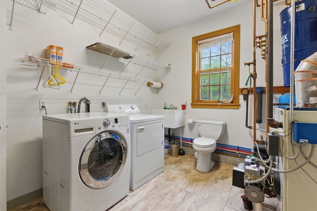 50 Claybrook Road Sunderland, MA 01375 - Photo 17 of 18 a utility room with sink dryer and washer