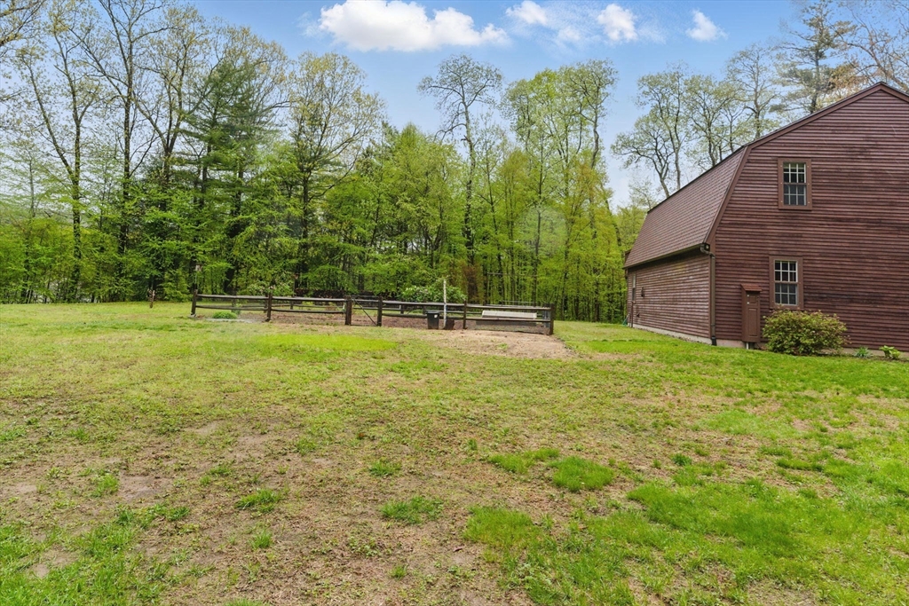 50 Claybrook Road Sunderland, MA 01375 - Photo 18 of 18 a backyard of a house with lots of green space