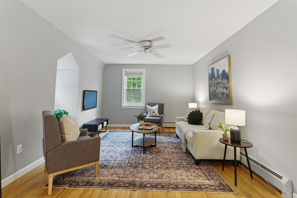 50 Claybrook Road Sunderland, MA 01375 - Photo 5 of 18 a living room with furniture and a rug