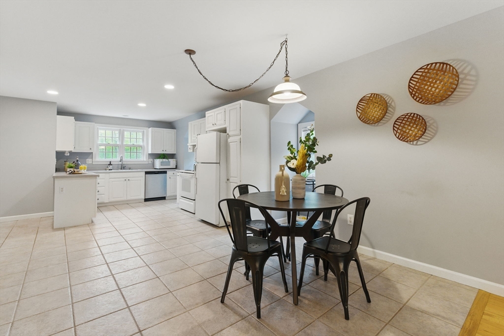 50 Claybrook Road Sunderland, MA 01375 - Photo 7 of 18 a view of dining table chairs and chandelier