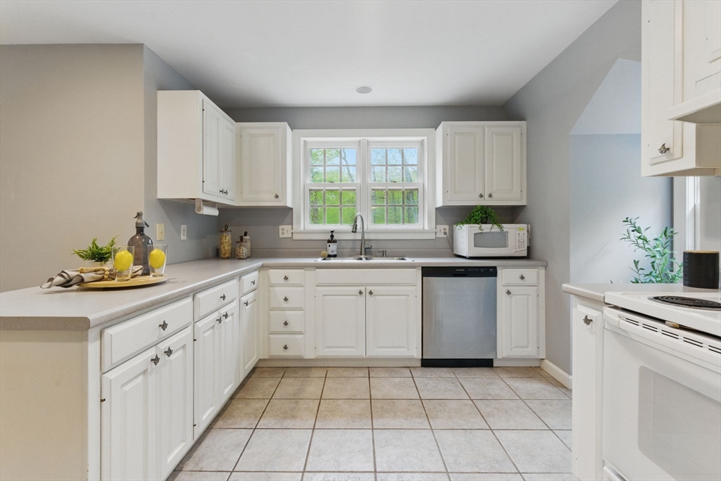 50 Claybrook Road Sunderland, MA 01375 - Photo 9 of 18 a kitchen with appliances cabinets and a window