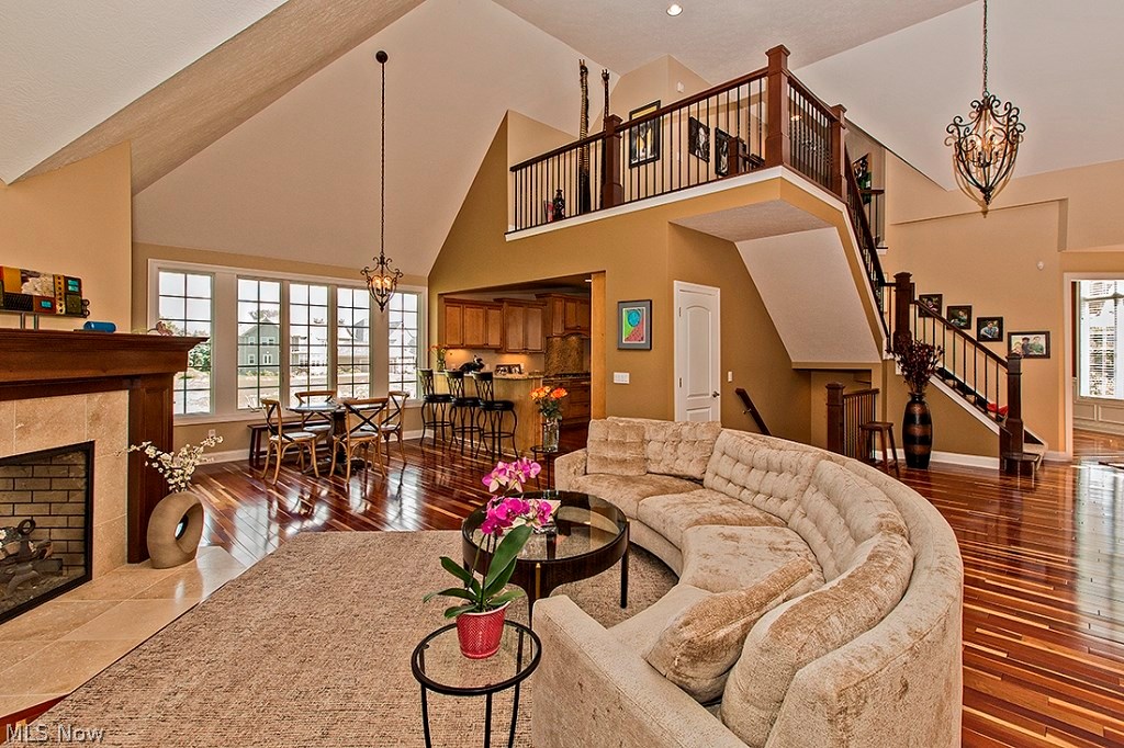 3375 Legends Way Cleveland, OH 44124 - Photo 7 of 33 Spectacular Great Room with Soaring Ceilings, Natural Cherry Hardwood Floors, Custom Built-ins and Two Sided Fireplace