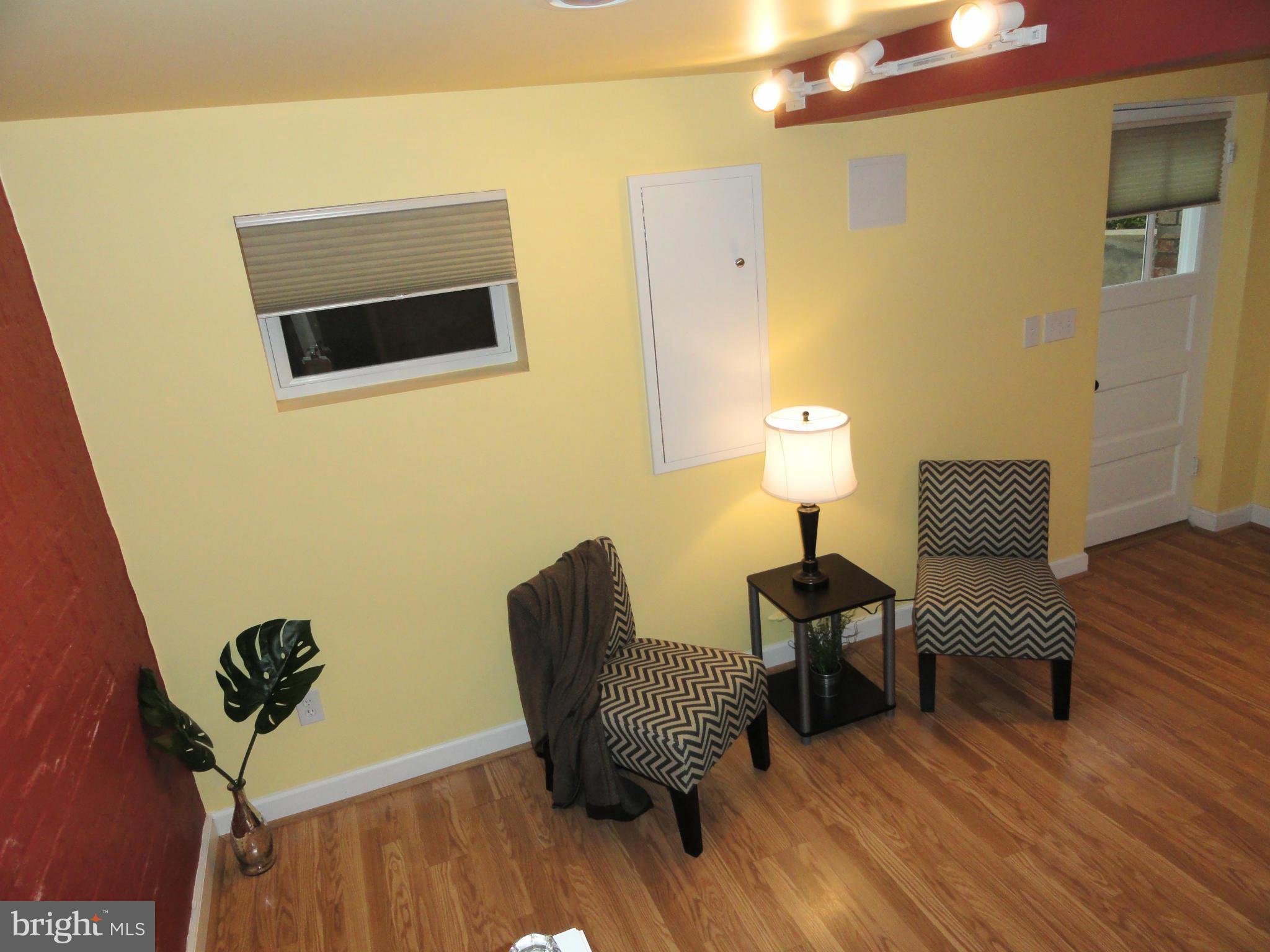 2443 Tunlaw Road Northwest Washington, DC 20007 - Photo 24 of 30 Rec Room with separate front entrance