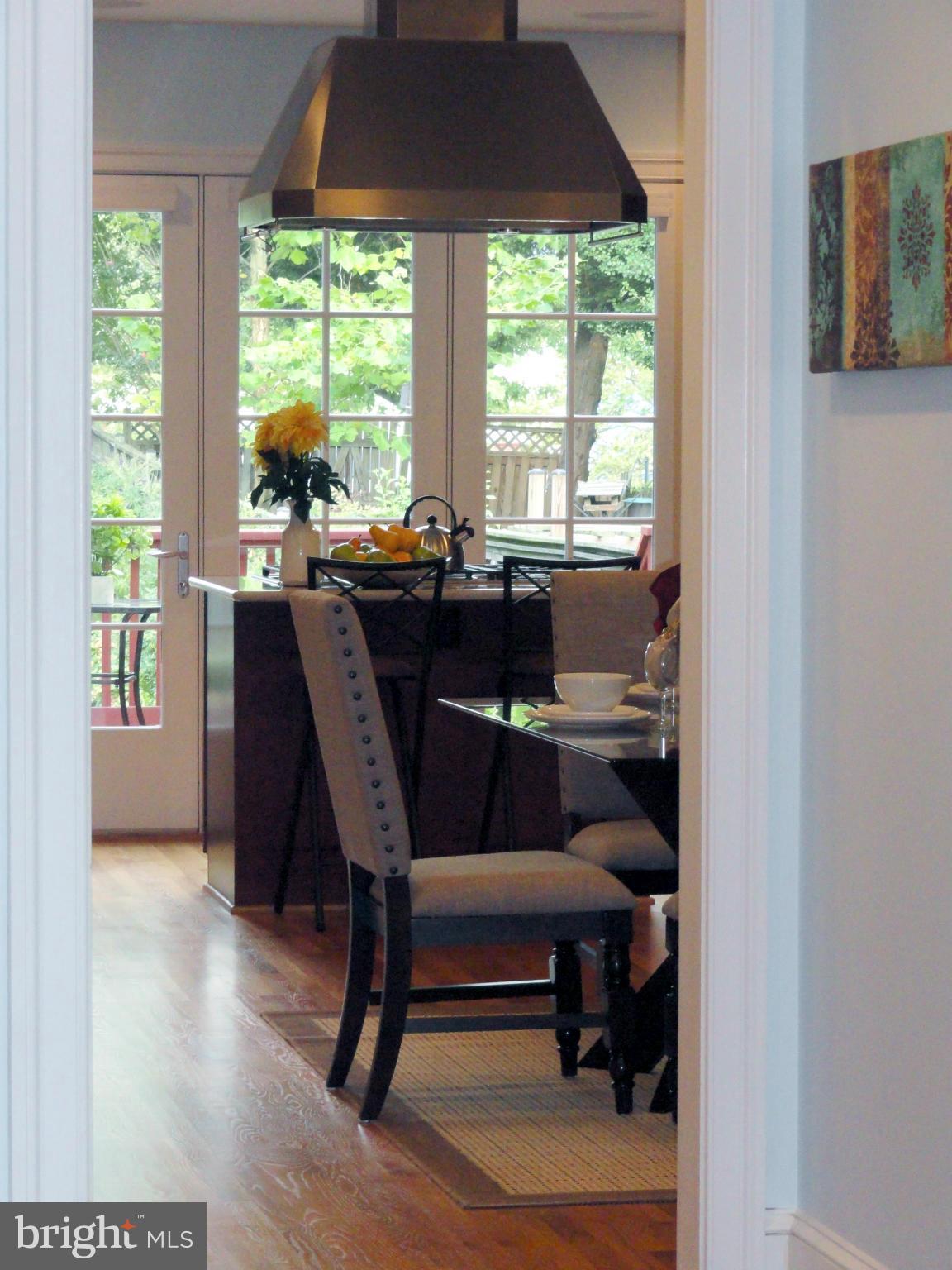 2443 Tunlaw Road Northwest Washington, DC 20007 - Photo 7 of 30 View of Dining Room and beyond