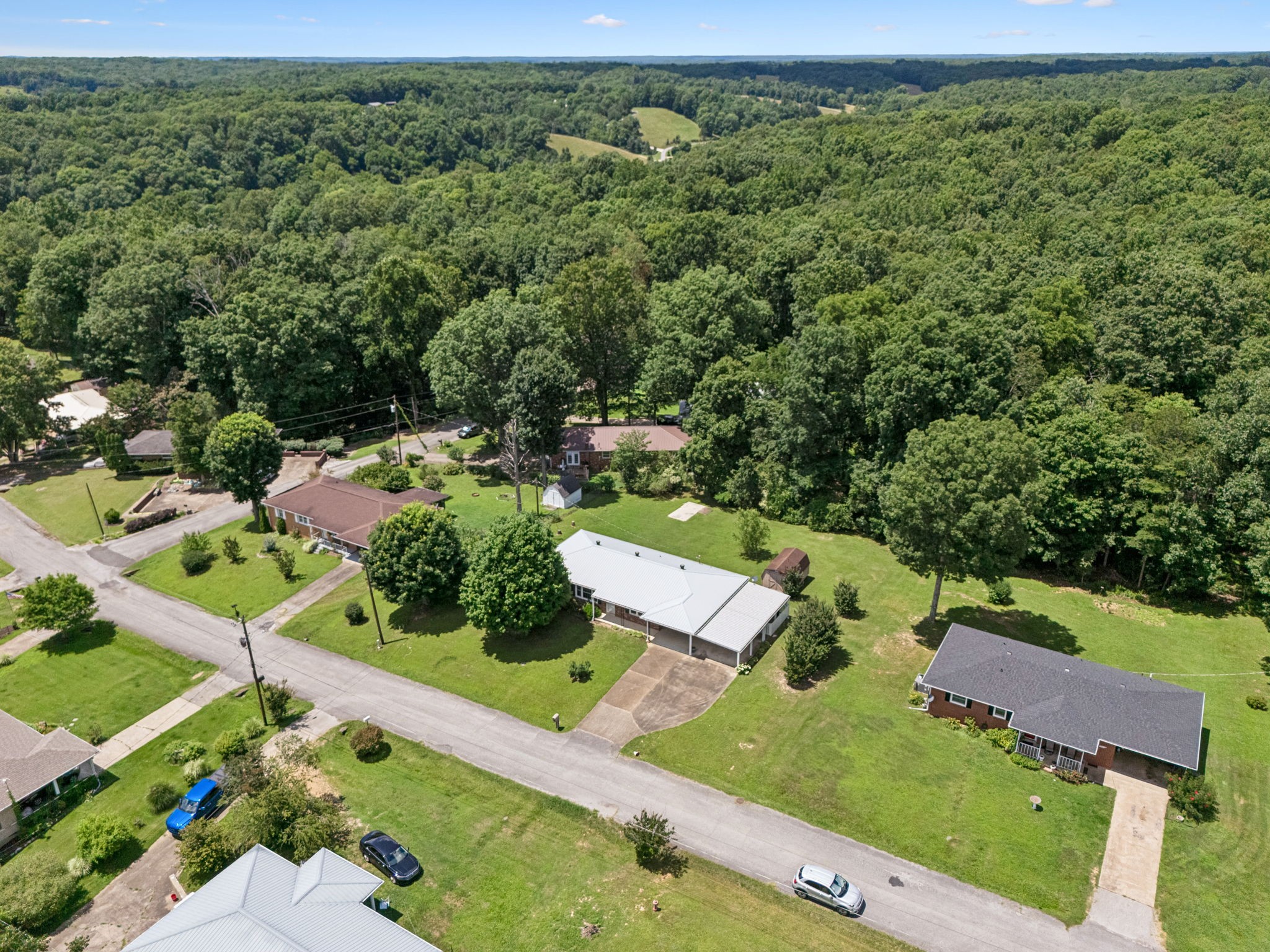 708 Hickory Street Centerville, TN 37033 - Photo 45 of 57 an aerial view of a house with a yard