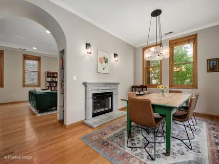 a view of a livingroom with furniture window and wooden floor