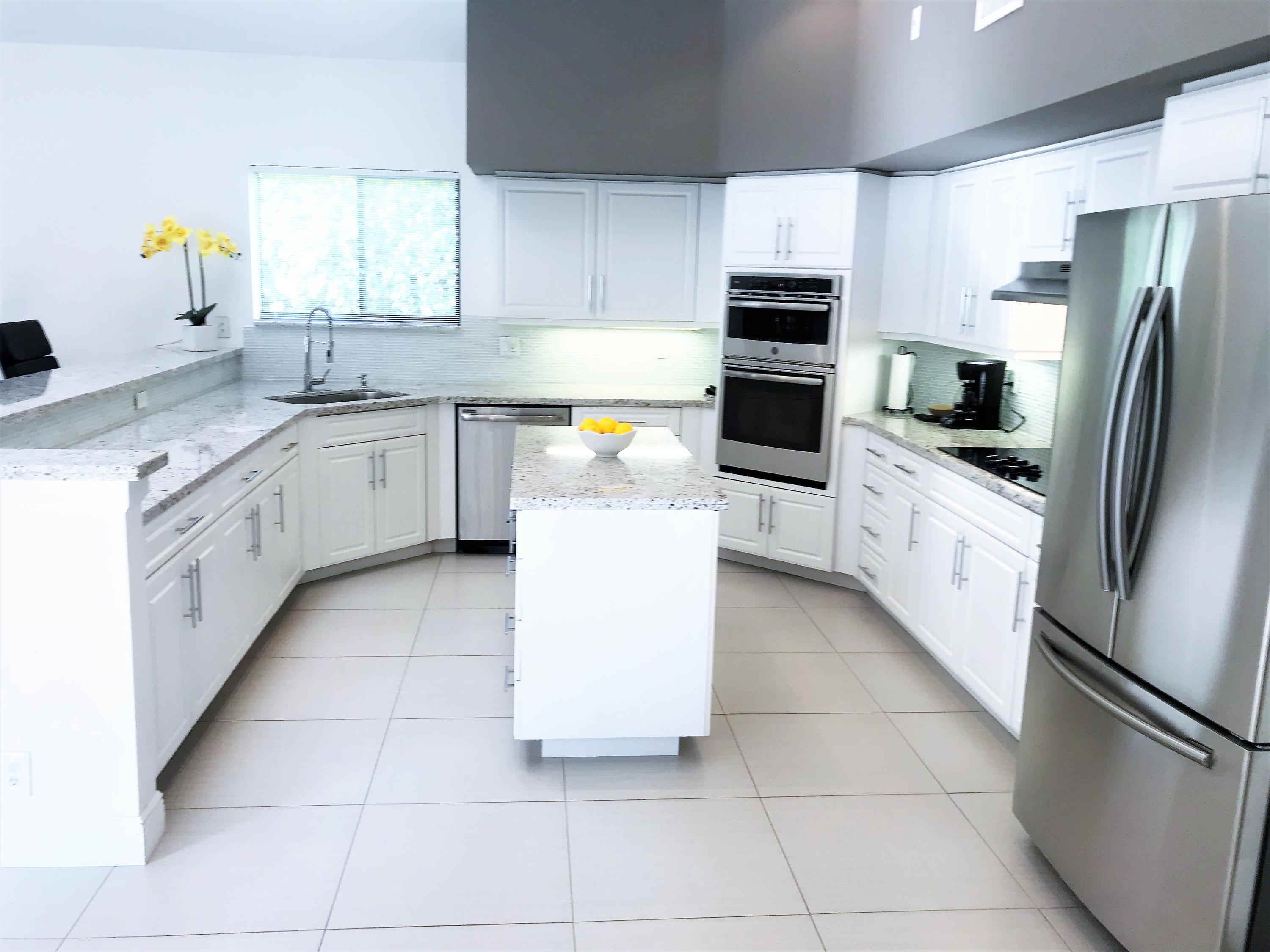 4801 Northwest 25th Way Boca Raton, FL 33434 - Photo 12 of 51 Kitchen Island