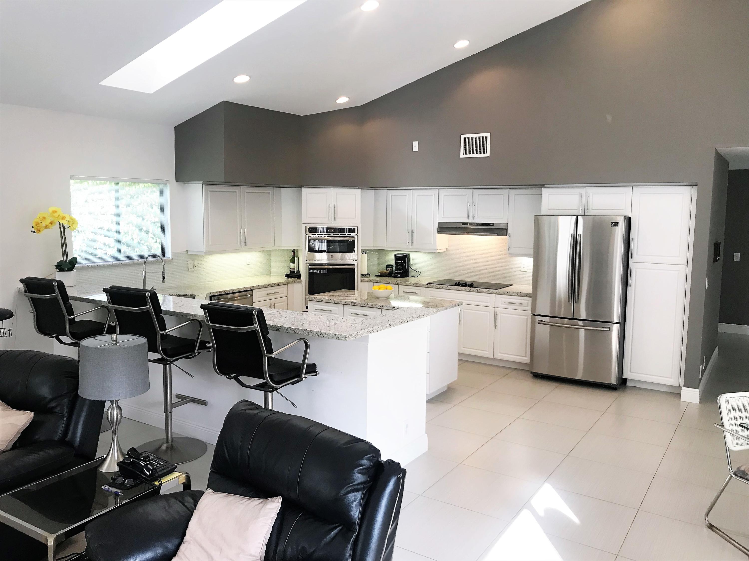 4801 Northwest 25th Way Boca Raton, FL 33434 - Photo 15 of 51 Kitchen Family Room