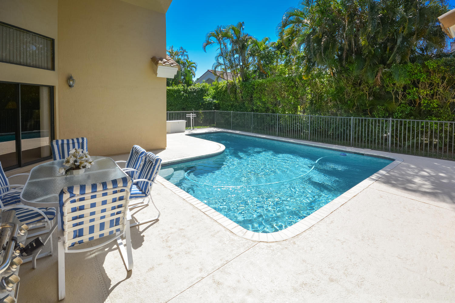 4801 Northwest 25th Way Boca Raton, FL 33434 - Photo 19 of 51 Pool Pation view from Kitchen