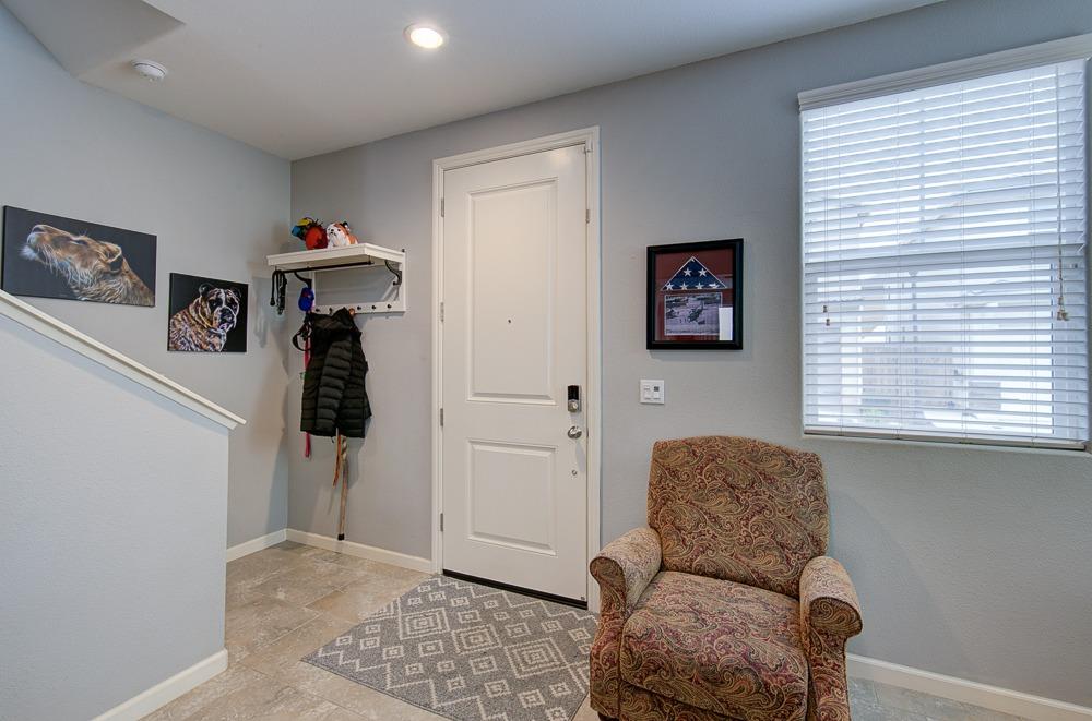 1530 Nabors Drive Clovis, CA 93619 - Photo 12 of 27 a living room with furniture and a window
