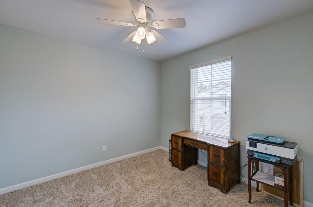 1530 Nabors Drive Clovis, CA 93619 - Photo 16 of 27 a room with furniture and windows