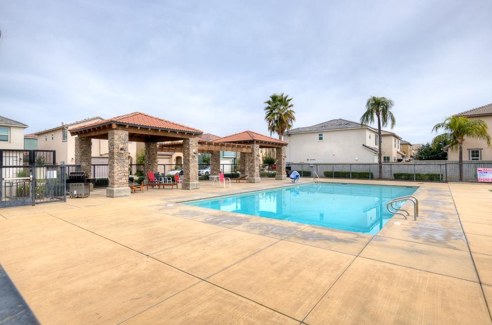 1530 Nabors Drive Clovis, CA 93619 - Photo 24 of 27 a view of a house with swimming pool