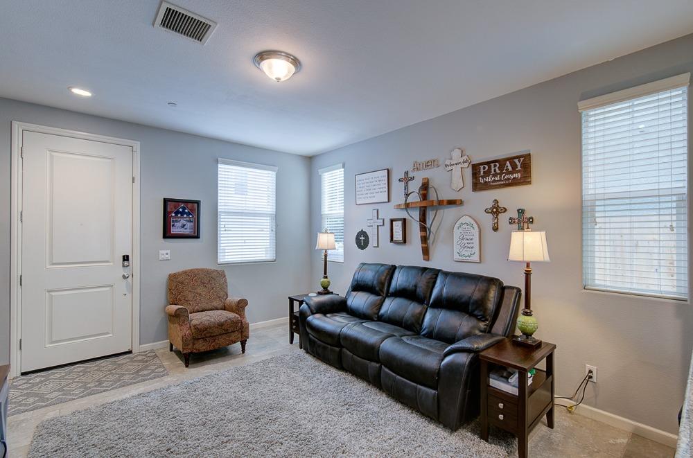 1530 Nabors Drive Clovis, CA 93619 - Photo 3 of 27 a living room with furniture and a window
